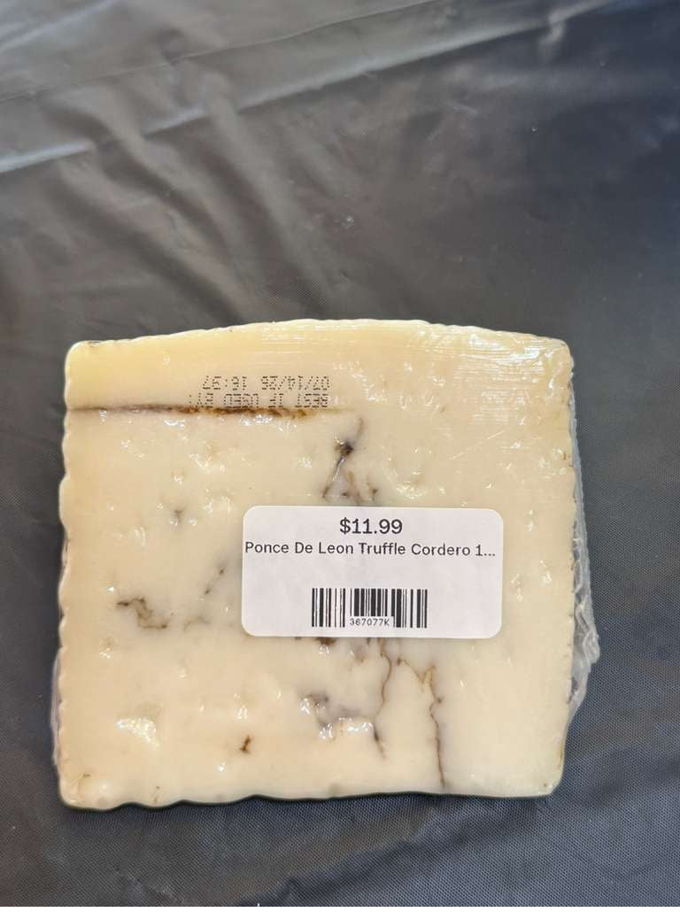 Ponce de León Truffle Cordero – Sheep’s Milk Cheese with Black Truffle (Spain).